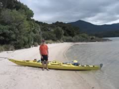 Standing in front of the Kayak