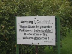 Storm warning sign in park